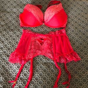 Victoria’s Secret pink bra and garter belt